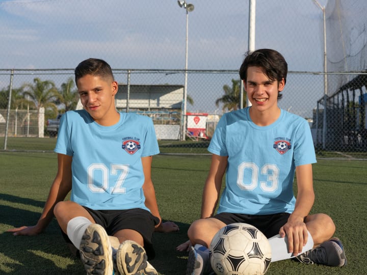 soccer players with soccer ball on soccer feild