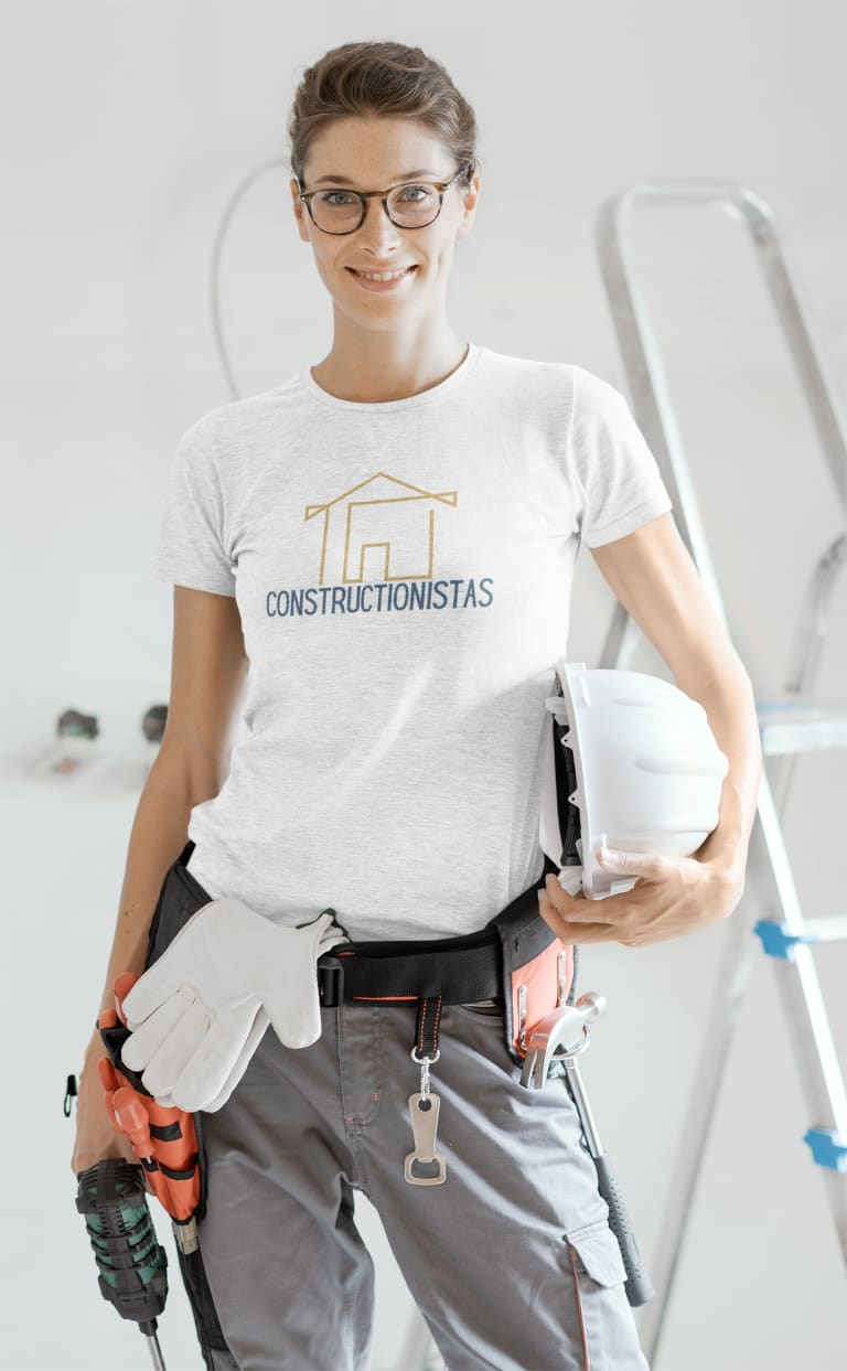 woman at construction site wearing custom company shirt