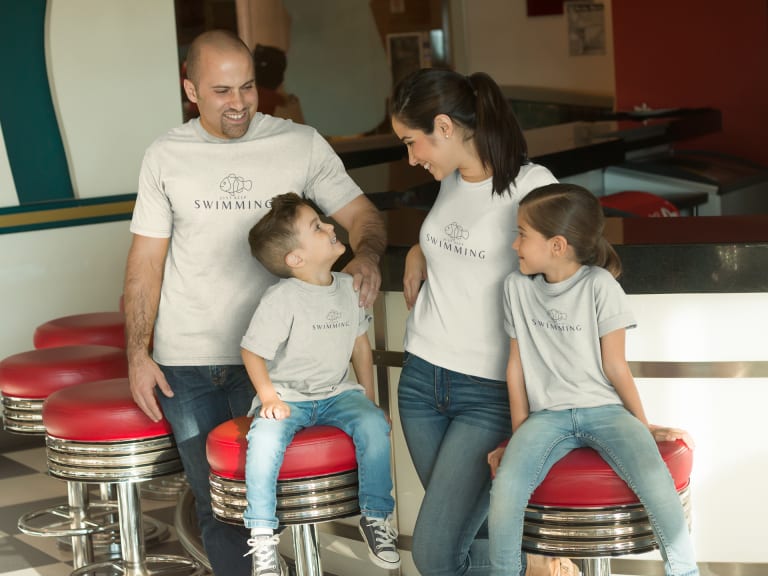 family wearing custom printed disney vacation t shirts