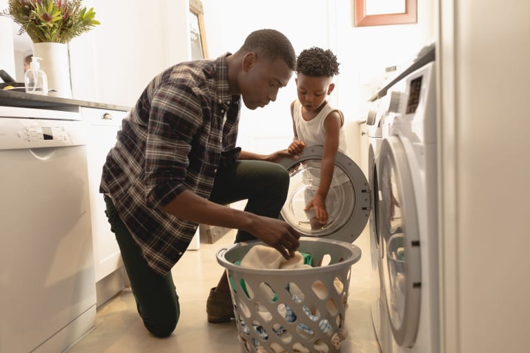 Father & Son Washing Clothes